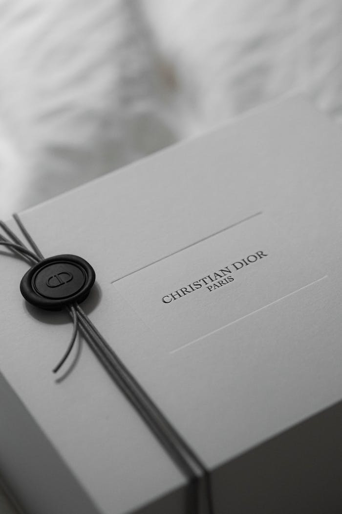 Services A stylish Christian Dior gift box with iconic branding in elegant packaging.